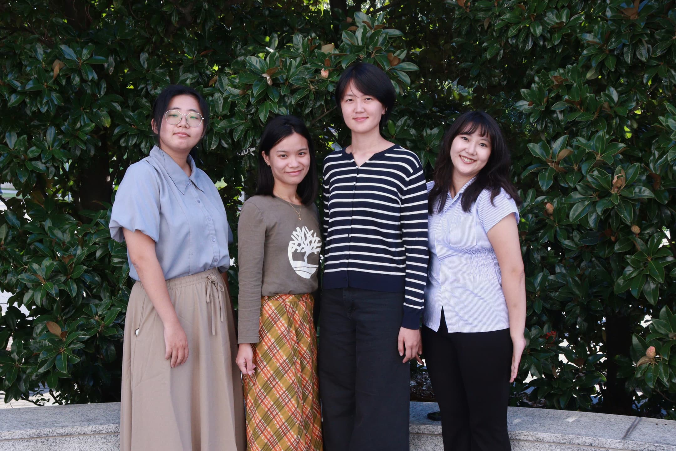 Taiwan trainees and ALIEEP staff standing together outdoors for a group photo